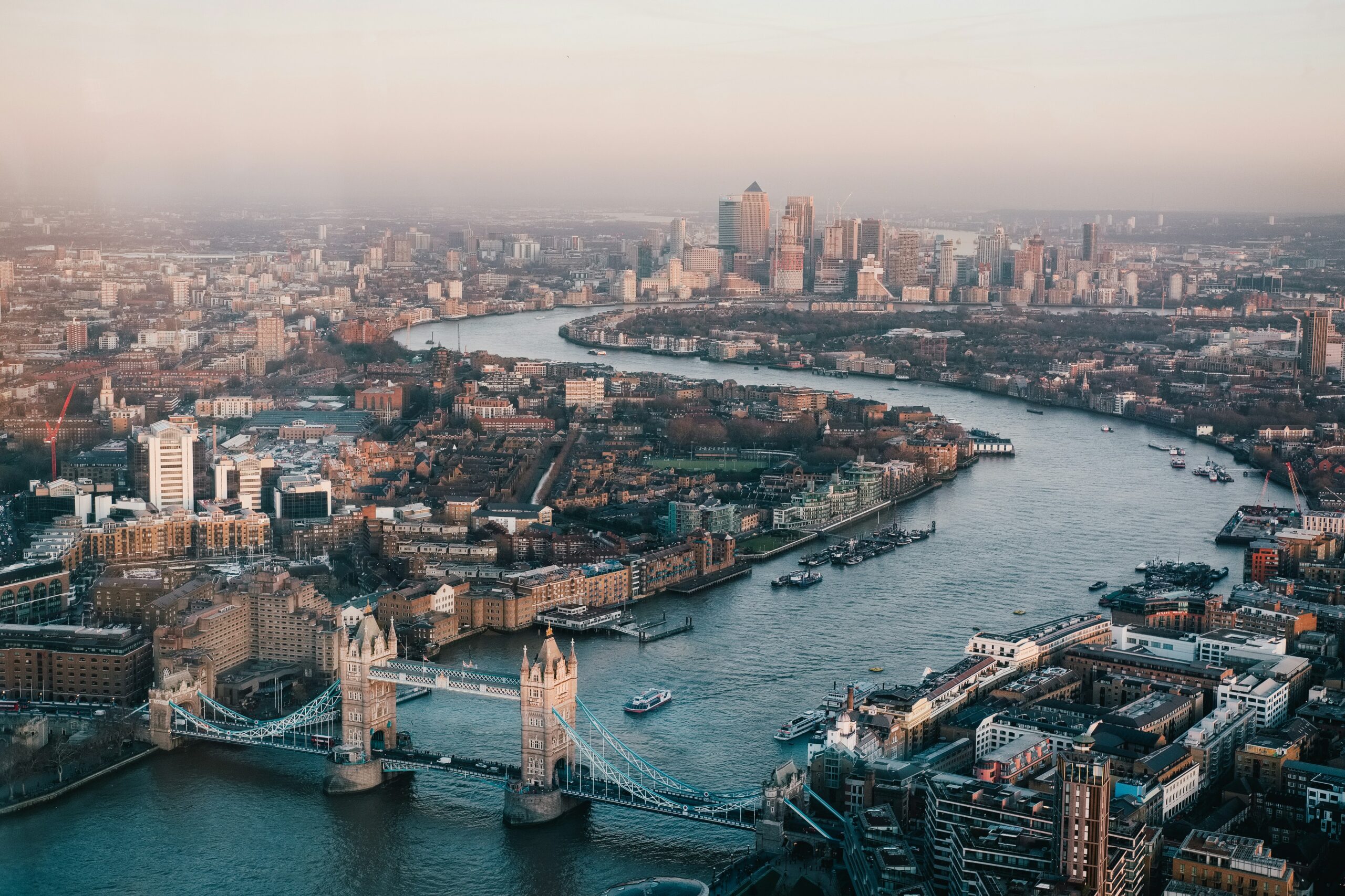 The Thames river winding through the City of London