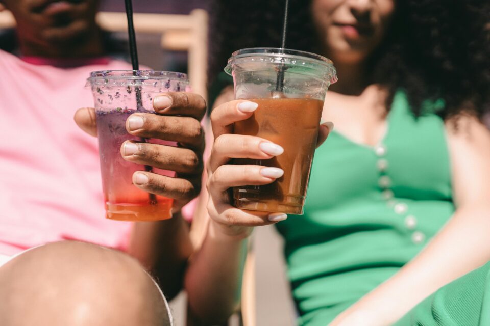 enjoying refreshing iced coffees in the sun and nature with different falvourings and milk