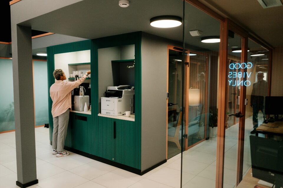 Lady taking a coffee micro break at work to refuel productivity