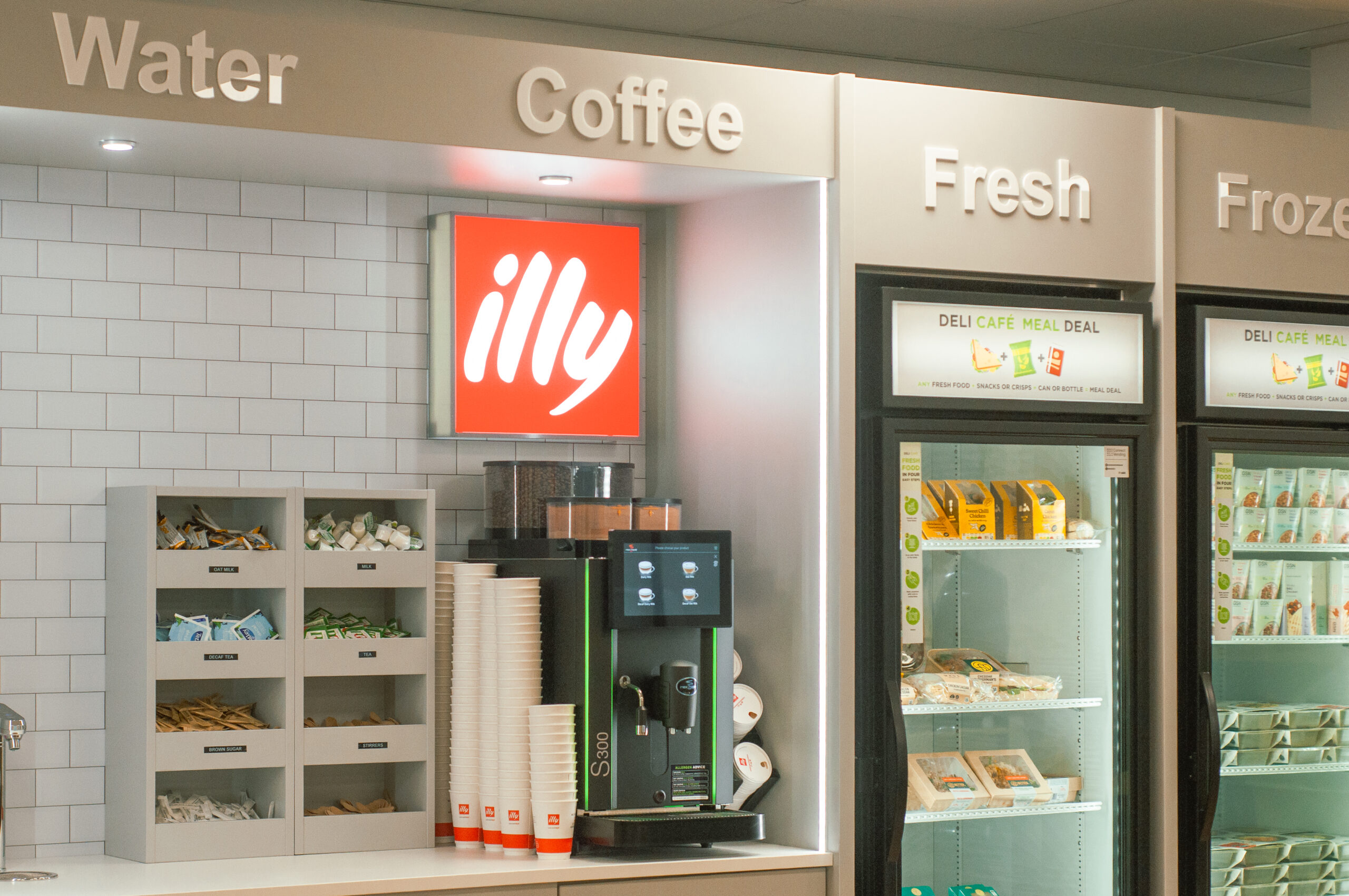 Connect Vending stocking commercial coffee machine condiment bar