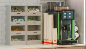 Connect Vending stocking commercial coffee machine condiment bar